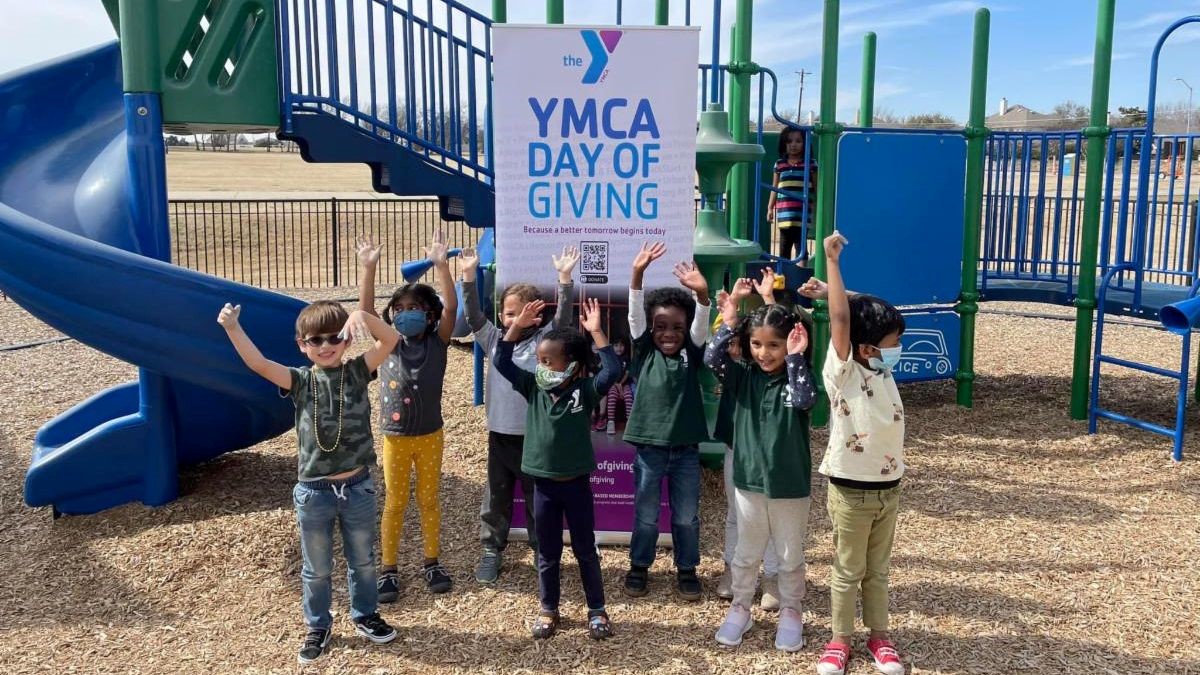 Kids playground cheering for YMCA Day of Giving