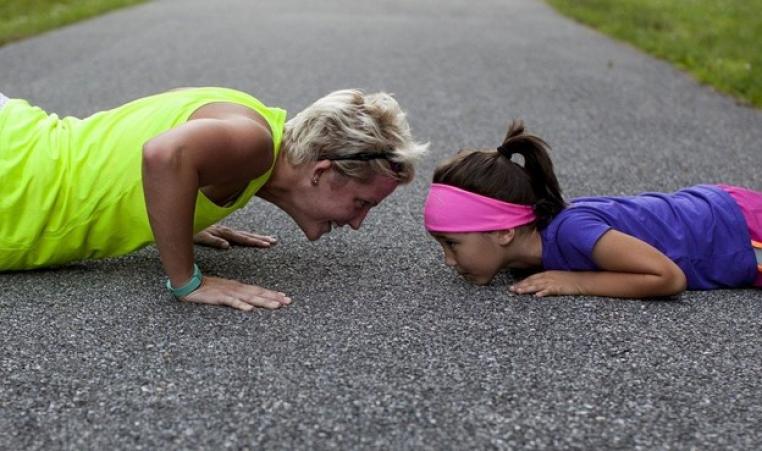 Mom and Young Daughter Push-Up