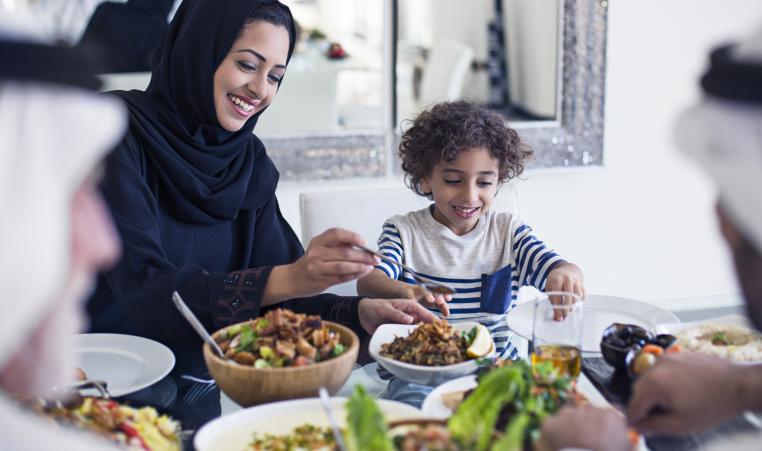 family meal; hijab woman
